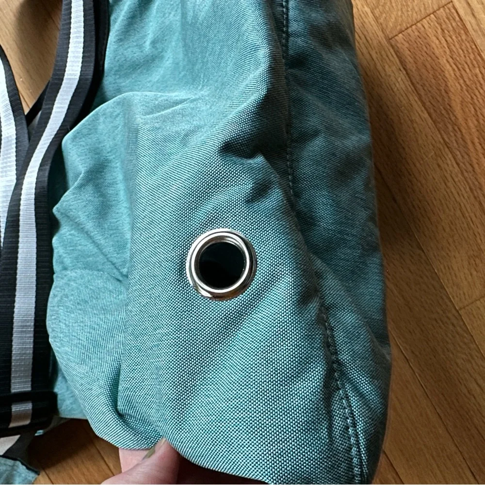 Teal Sling Dog Carrying Bag with Black and White Strap